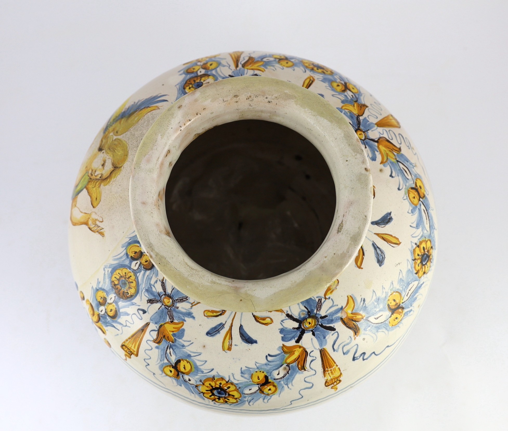 A large Italian maiolica bombola, 18th century, possibly Sicilian, 35cm diameter, 29.5cm high, some restoration, crack to base